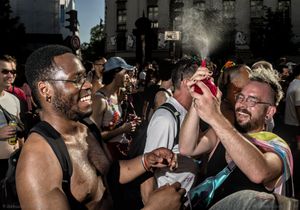 Guys are playng with spray water